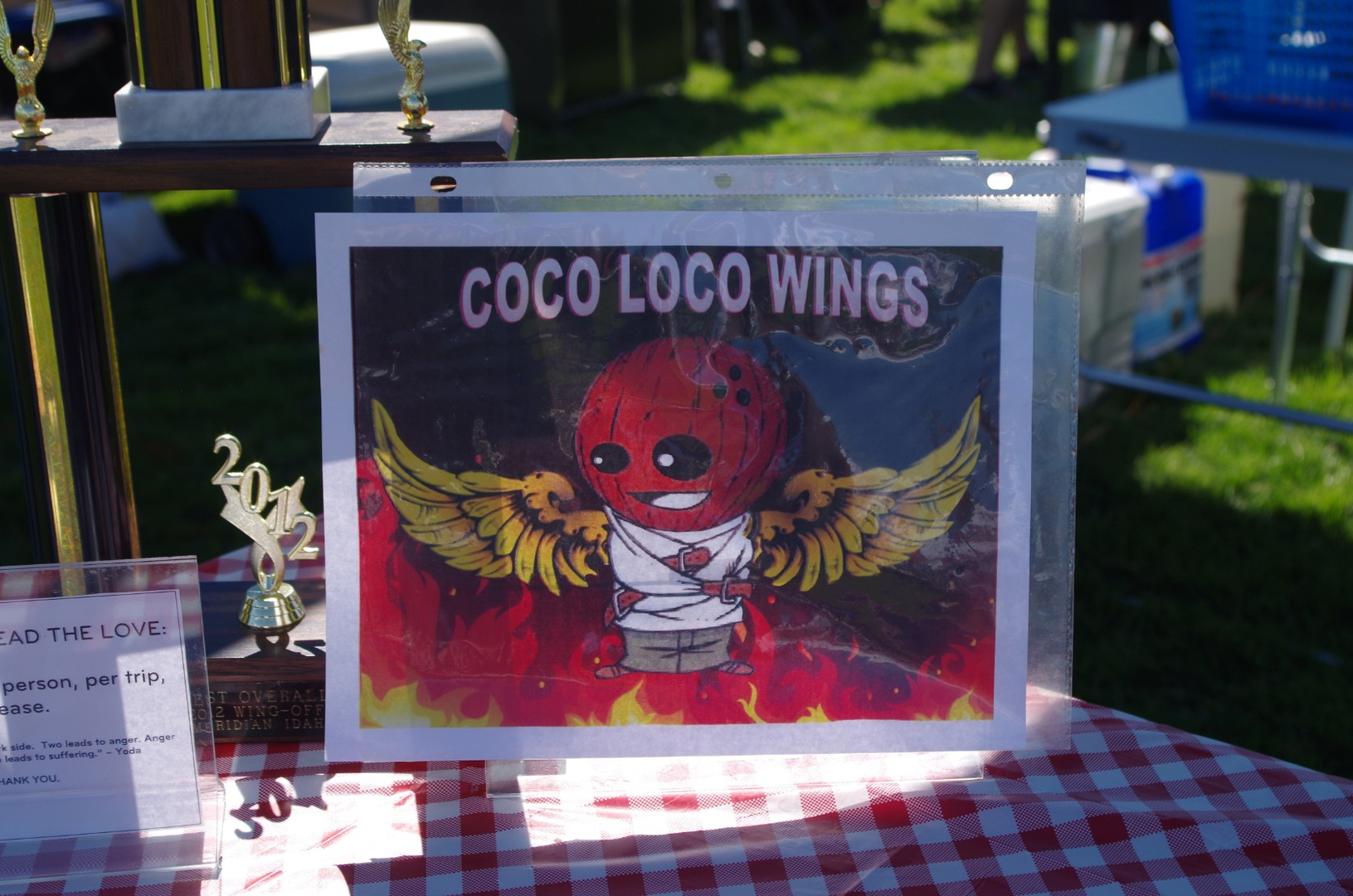 A sign that reads Coco Loco Wings